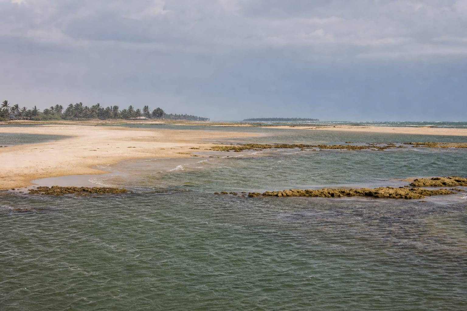 A shallow lagoon and sandbar under wind on the Kalpitiya peninsula, Sri Lanka