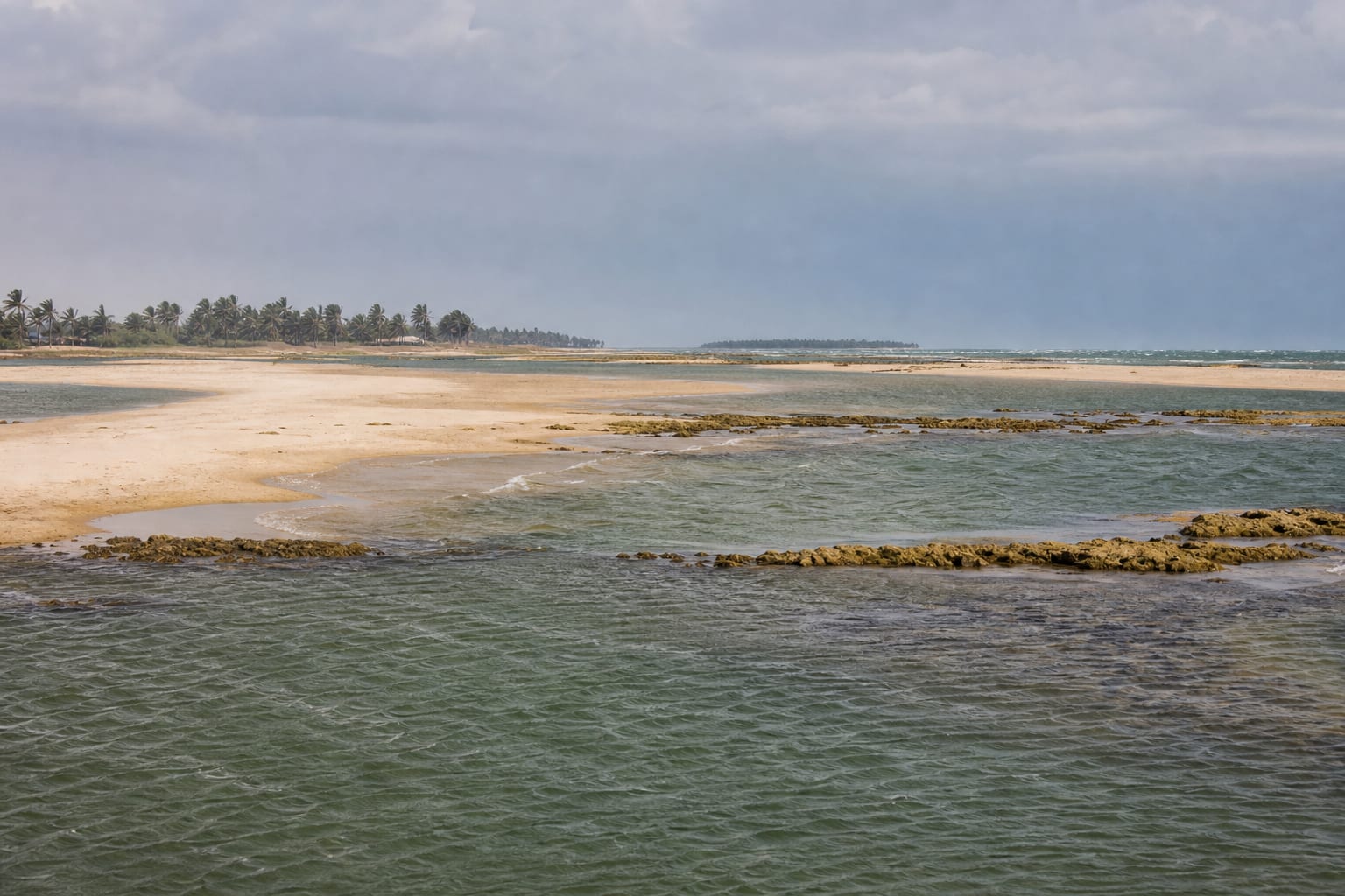 A shallow lagoon and sandbar under wind on the Kalpitiya peninsula, Sri Lanka